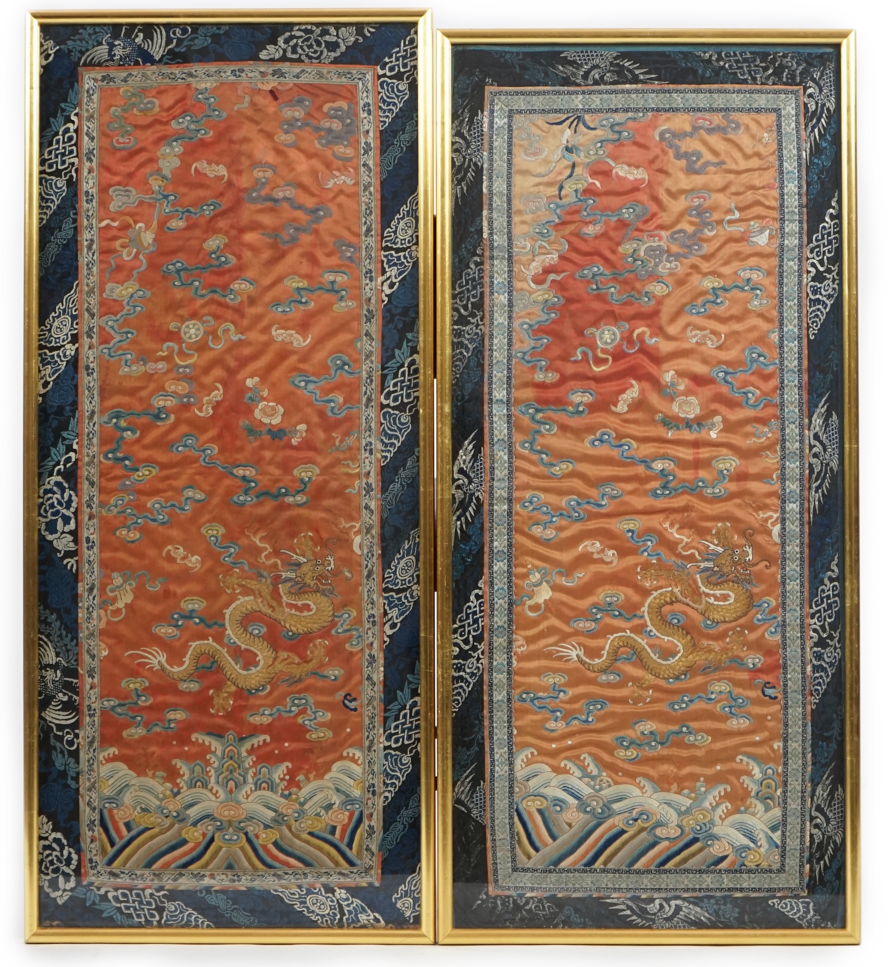 A pair of Chinese coral silk ‘dragon’ panels, 19th century